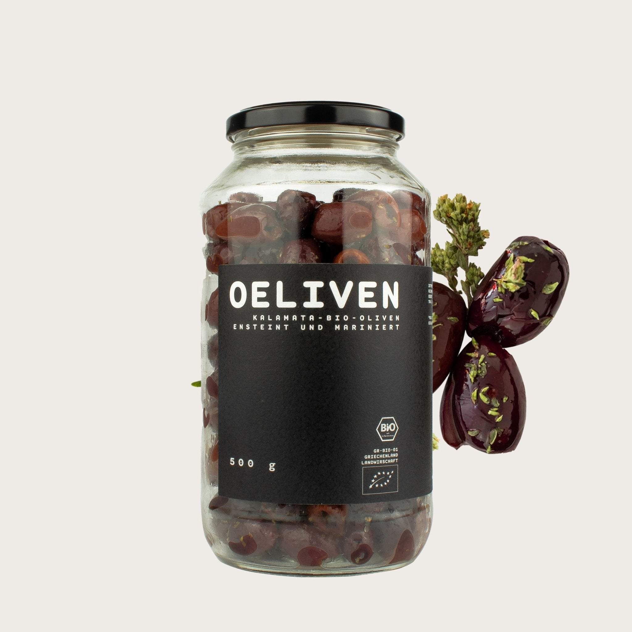 OELiven Kalamata 500 g - Bio Kalamata Oliven mit Kräutern - OEL - Griechische Produkte und Olivenöl - Bestandsartikel red. MWST (7%) - OEL Olivenprodukte